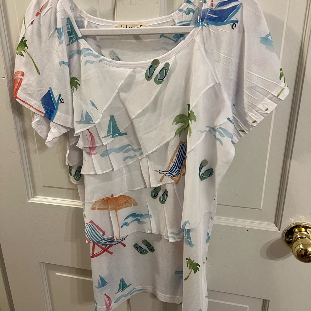 Tunic. Watercolor looking pics on this item. Layered. Never worn.